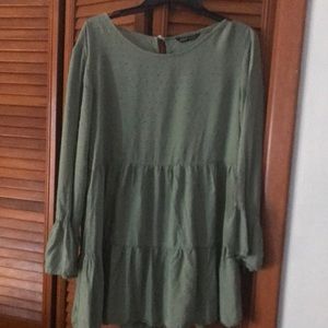 Adorable casual or dress with pair of dress pants. Really cute and sassy wear.